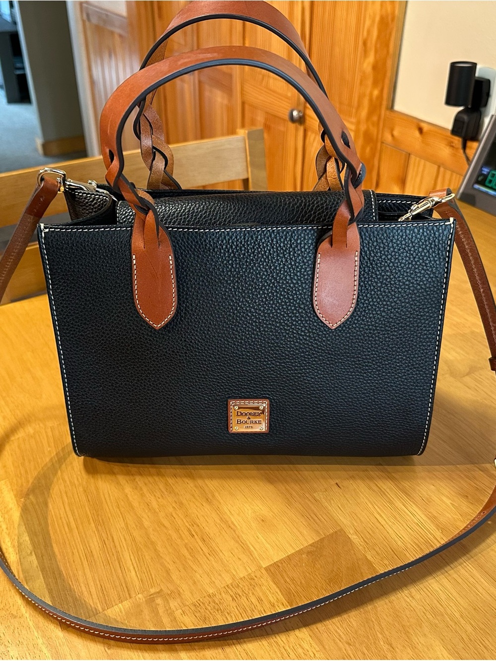 Dooney & Bourke Black Pebble Leather Satchel with Brown Trim and Handles